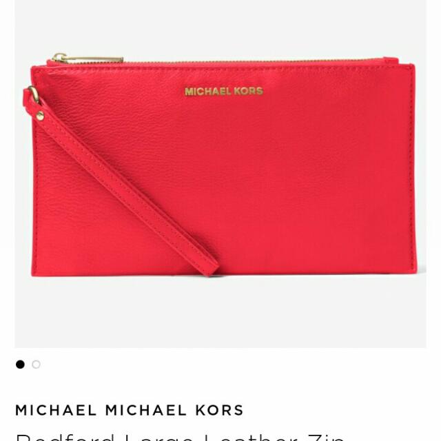 Authentic Mk Wristlet Large (Category: Purses & Pouches) located in Quezon City. Submitted by m_1021 (Listing ID 150110324, Image 1). Description: .