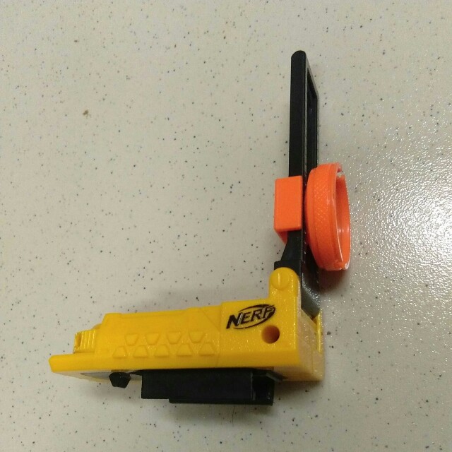 Nerf attachment (Category: Action & Battle Toys) located in Kuching. Submitted by arepex66 (Listing ID 150100207, Image 2). Description: Nerf tactical light sigh...