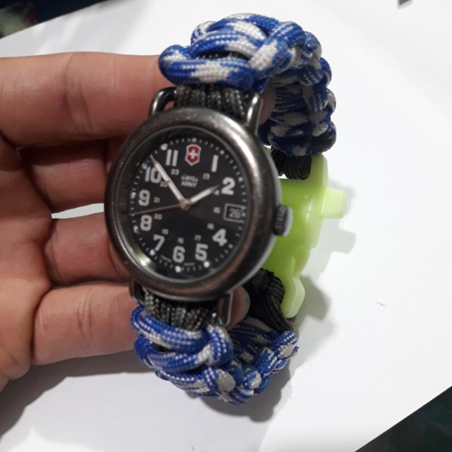 SWISS ARMY WATCH (Category: Men's Watches) located in Manila. Submitted by thegreat. (Listing ID 150208726, Image 3). Description: Authentic Original Vintage classic look sign of usage stain on dial but not so noticeable Good running condition Swiss made Paracord strap Wrist size. 18 cm.