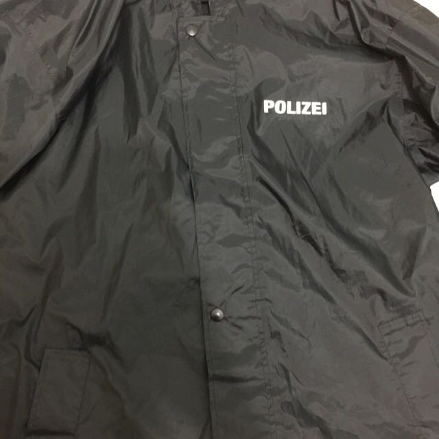 Vetements raincoat polizei store