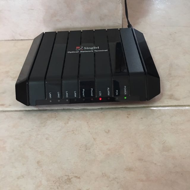 Singtel Optical Network Terminal With Power Adapter Electronics Others On Carousell