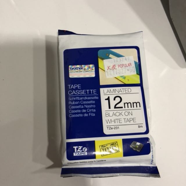 BROTHER Tape Cassette. Laminated. 12mm. Black on white tape, Hobbies