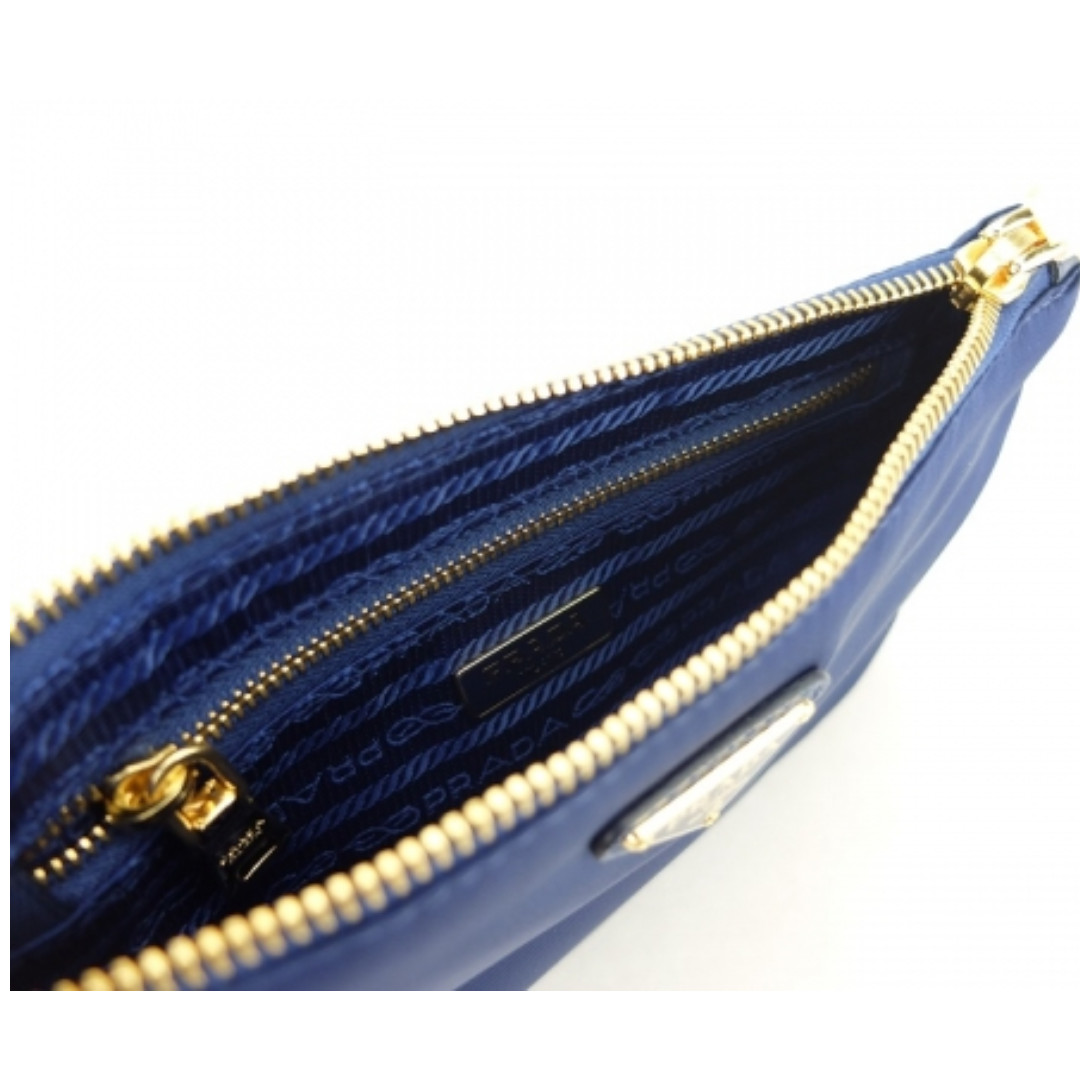 NEW) Prada  Maniglia Pouch (Royal), Women's Fashion, Bags &  Wallets, Purses & Pouches on Carousell