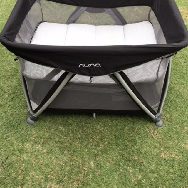 nuna travel cot size