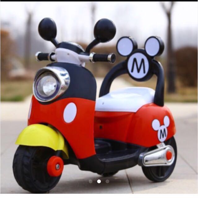 Baby girl deals electric bike