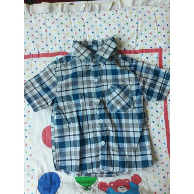 Checkered Polo 3T (Category: Babies & Kids Fashion) located in Muntinlupa City. Submitted by projectcleanup.ph (Listing ID 151730911, Image 1). Description: Excellent condition Used twice Fits 2 to 3 years old.