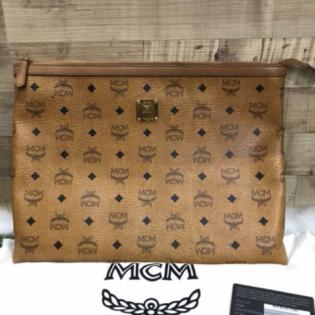 Mcm clutch bag price clearance