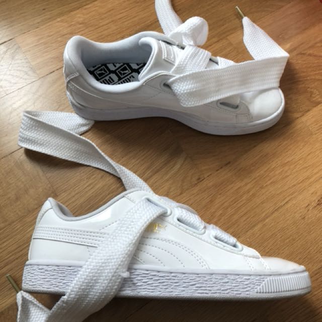 Glossy white puma sneakers