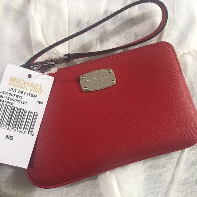 red michael kors wristlet