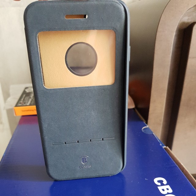 iphone 7 casing (Category: Other Mobile & Gadget Accessories) located in Singapore. Submitted by hidxxx (Listing ID 152863580, Image 1). Description: iphone 7 phone casing.Used-Condition 8/10.Colour-dark blue. Selling as no longer using iphone..