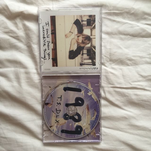 Taylor Swift 1989 Deluxe Album (Category: Music Accessories & Others) located in Brampton. Submitted by esthecosgrove01 (Listing ID 153001778, Image 3). Description: Taylor Swift 1989 deluxe album. Lightly used Includes CD as well as flip through book !! POLAROIDS NOT INCLUDED !! .