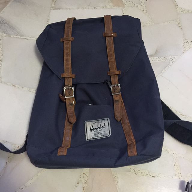 herschel backpack leather peeling