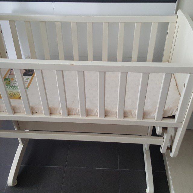 swinging crib mattress mothercare
