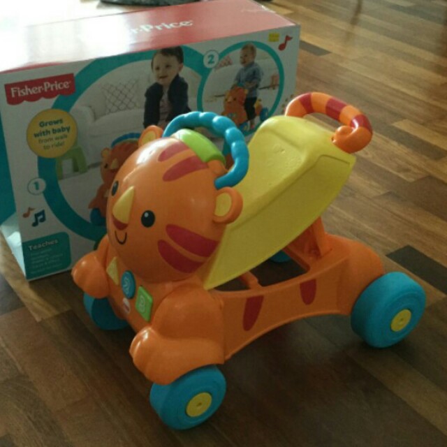 Fisher price stride to ride learning musical tiger walker