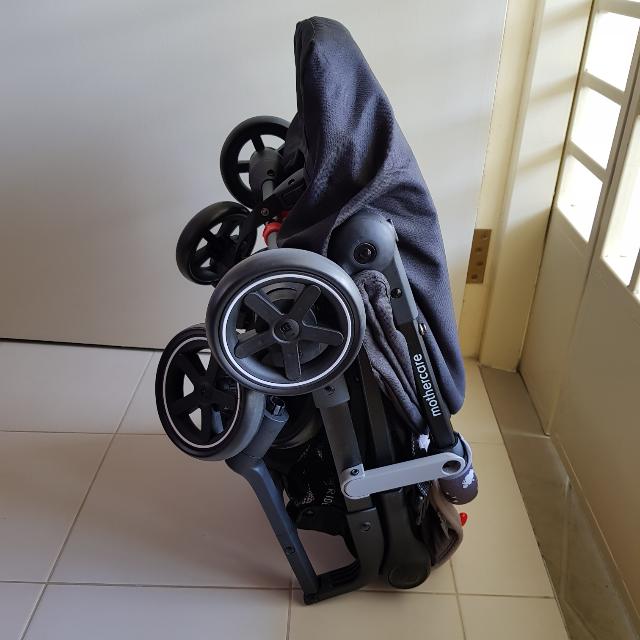 mothercare ride stroller