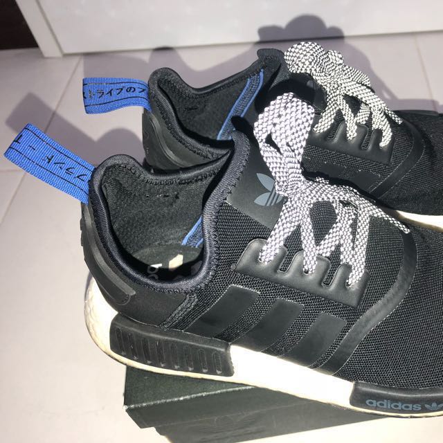 Nmd black on sale blue strap