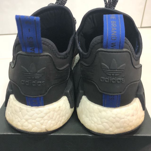 Nmd black on sale blue strap