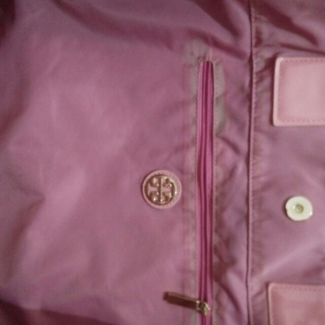 Tory Burch Ella Tote (Category: Tote Bags) located in Las Pinas. Submitted by Bloomer (Listing ID 154156060, Image 3). Description: Tory Burch Ella Tote Never use just stock there's a bit discoloration in the lining due to long storage, maybe it can be removed by dryclean Still in excellent condition This was a supplier token and they said its authentic bought in SG Good stiches lining Zipper has torry burch embossed but don't have tag from where