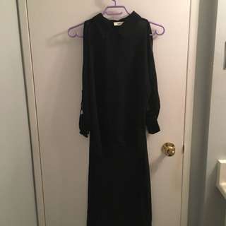 Black shirt with long back and shoulder cut outs