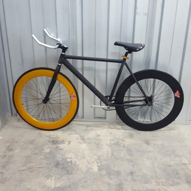 black and gold fixie bike