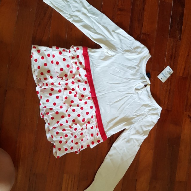 Gals top (Category: Babies & Kids Fashion) located in Singapore. Submitted by felmax (Listing ID 155356721, Image 2). Description: GAP top Comfortable soft cotton material with nice frills..