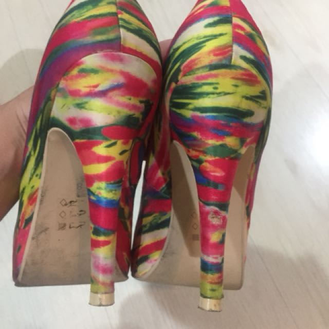 Call it Spring multicolor peep toe heels (Category: Heels) located in Quezon City. Submitted by mdjpl (Listing ID 155557547, Image 3). Description: Size 8 In good condition except for flaw one back heel 4.5 inch heels RFS: Decluttering.