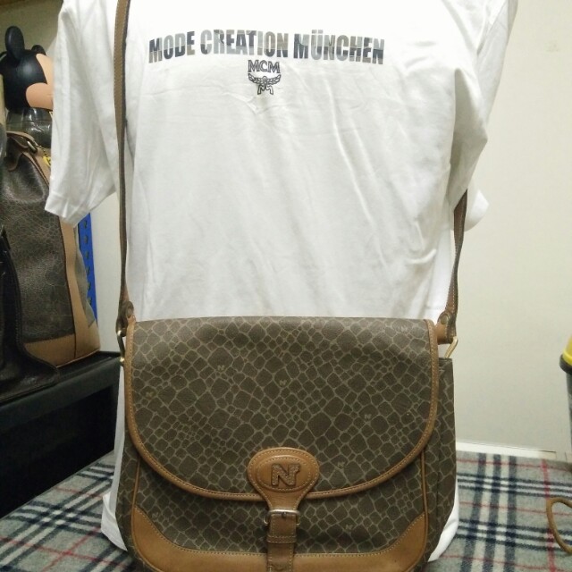 Nina ricci sling 2025 bag