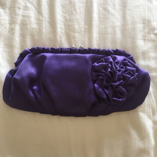 Purple satin purse (Category: Purses & Pouches) located in Quezon City. Submitted by mdjpl (Listing ID 155976916, Image 1). Description: Can be used for formal events Still in great condition RFS: Decluttering.