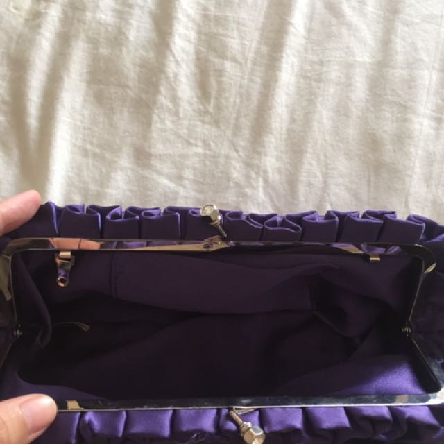 Purple satin purse (Category: Purses & Pouches) located in Quezon City. Submitted by mdjpl (Listing ID 155976916, Image 2). Description: Can be used for formal events Still in great condition RFS: Decluttering.