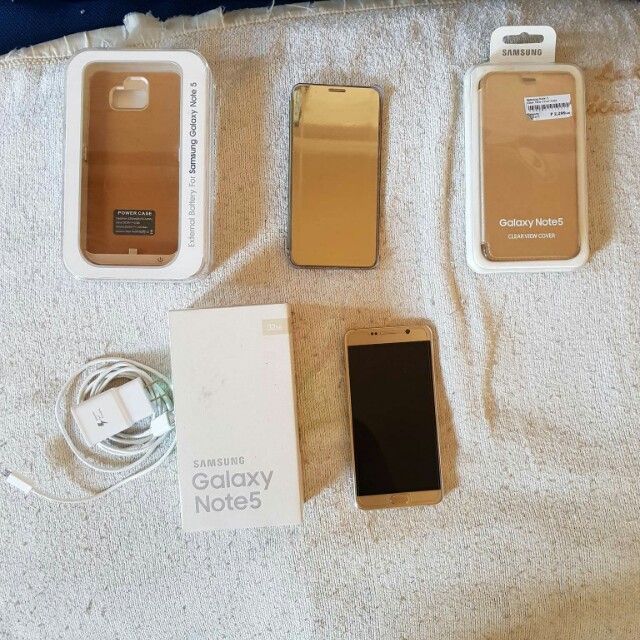 Samsung Note 5 (Category: Samsung) located in Mandaluyong City. Submitted by junard18 (Listing ID 155990977, Image 1). Description: Samsung Galaxy Note 5 (Platinum Gold) For sale 4gb RAM 32GB Dual sim With 3 cases na kasama: Power case Clear view Leather May kasama na rin samsung level bluetooth headset. Good condition.