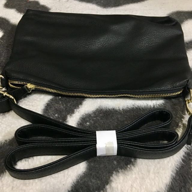 steve madden black sling bolsa