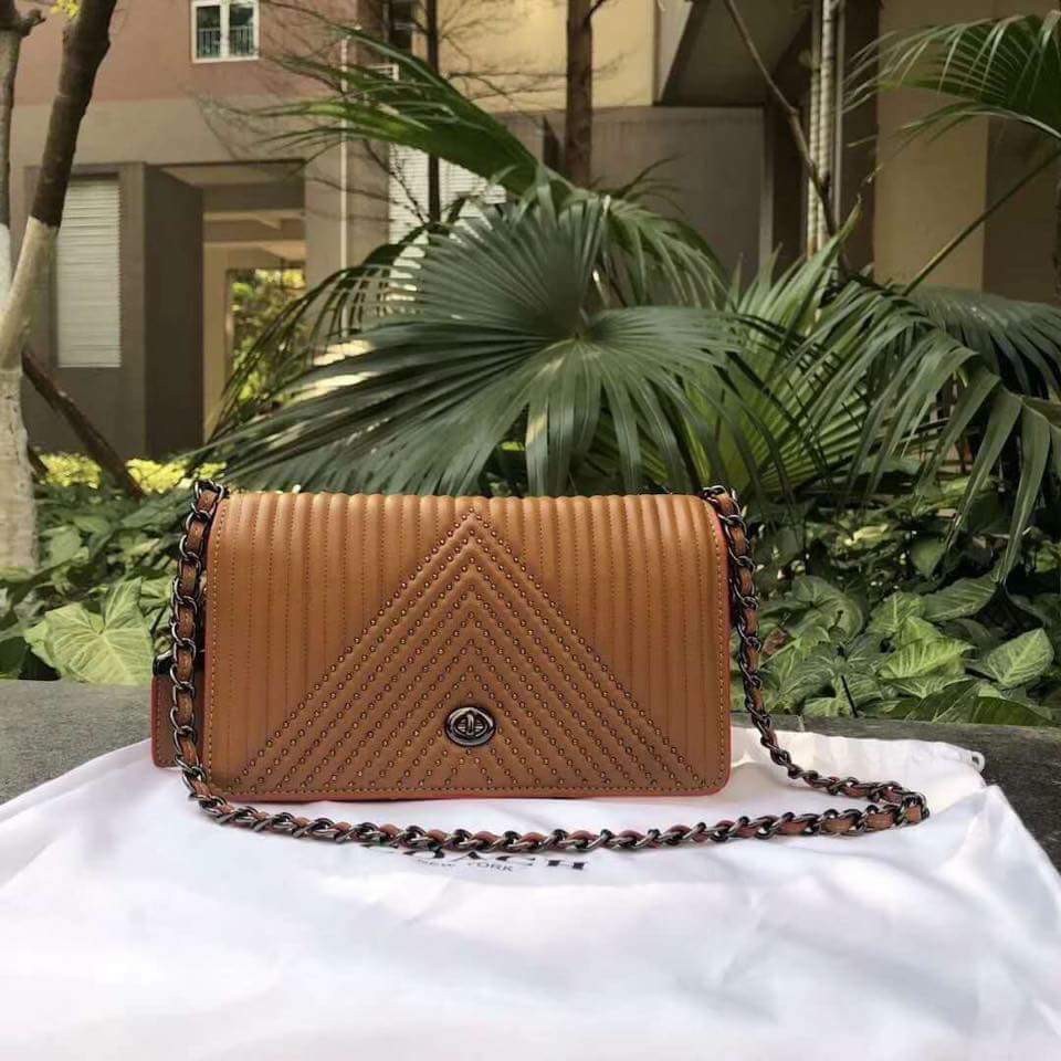 coach dinky quilted black