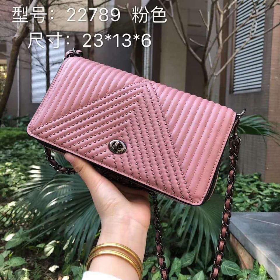 coach dinky quilted black