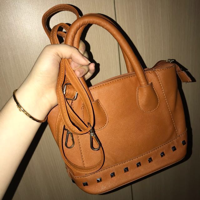 Original CLN sling Bag, Women's Fashion, Bags & Wallets, Cross-body Bags on  Carousell