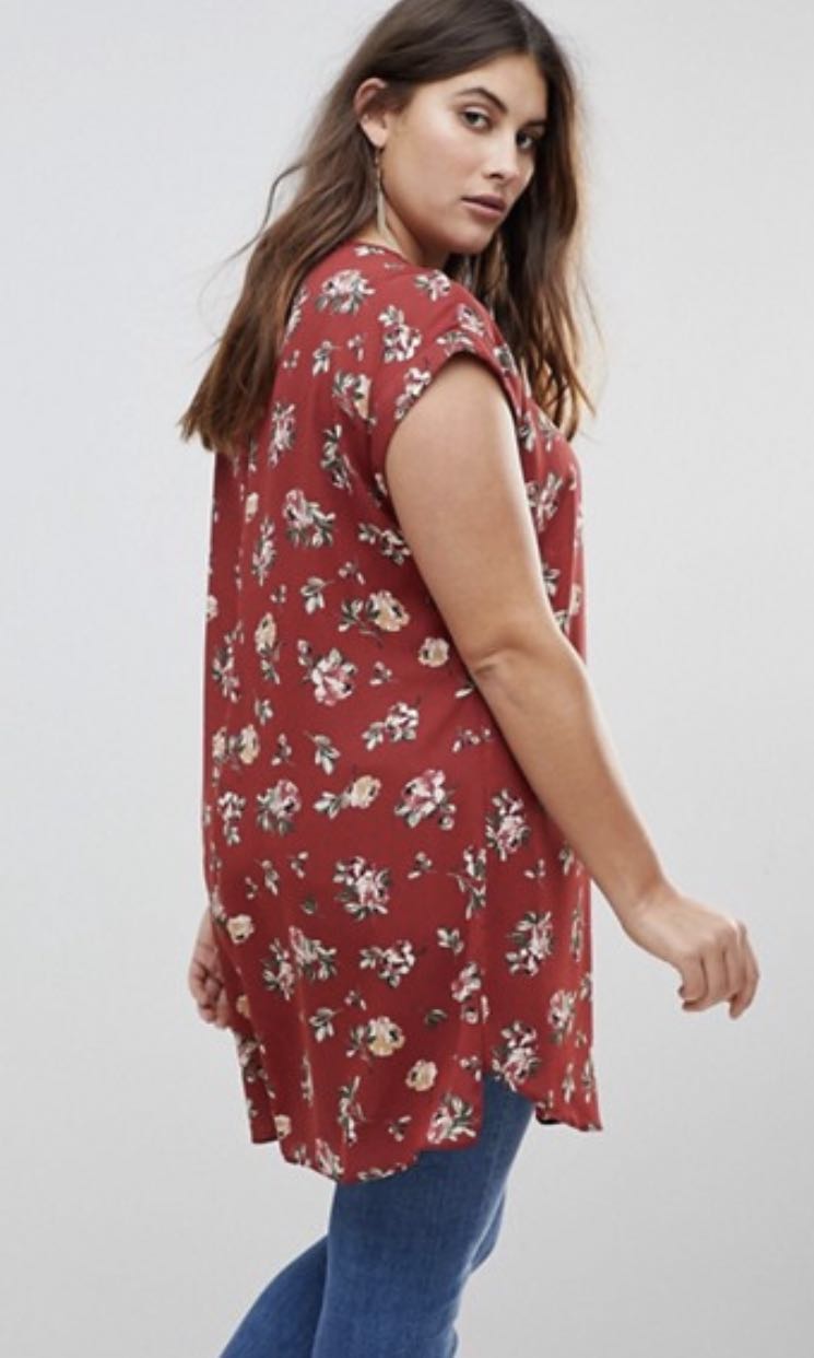 new directions printed zipper tunic to