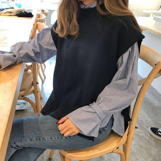 blue knitted vest