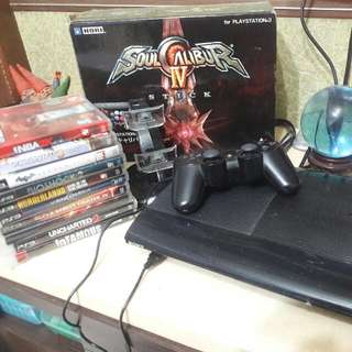 ps3(500GB)+1 controller with charger dock+ Soul Calibur IV joystick + 12 games including   NBA 2k18 and DEvil May Cry..
