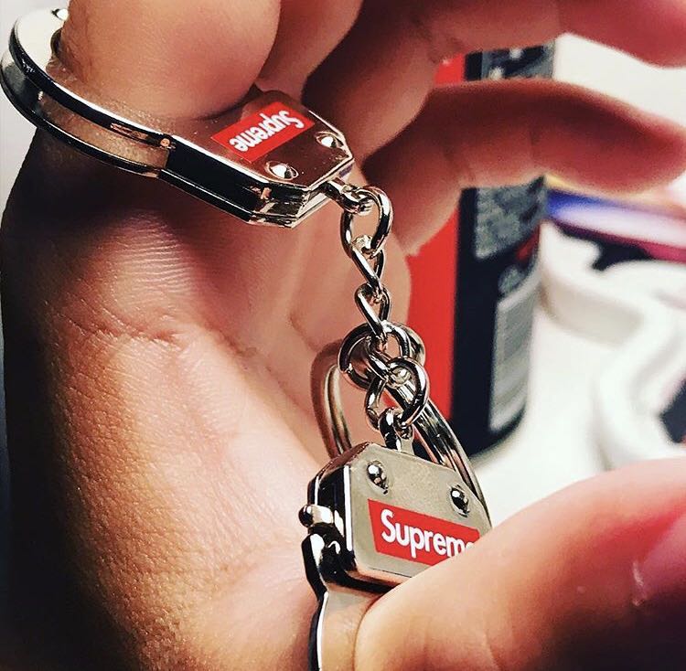Supreme handcuffs on sale keychain
