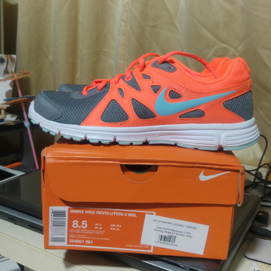 grey orange nike shoes