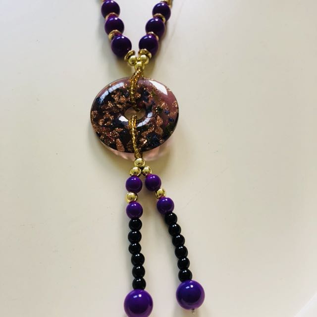 Purple and green necklace on sale