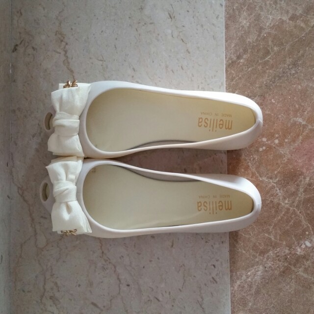 off white jelly shoes