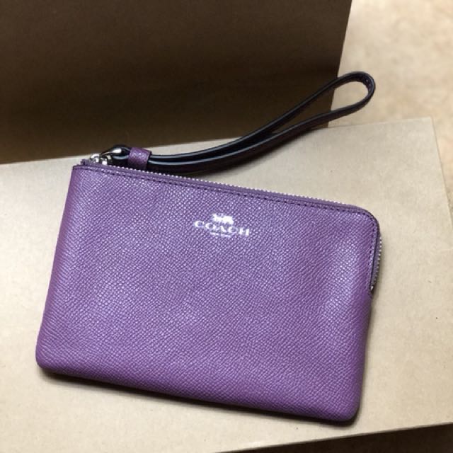 purple coach wristlets