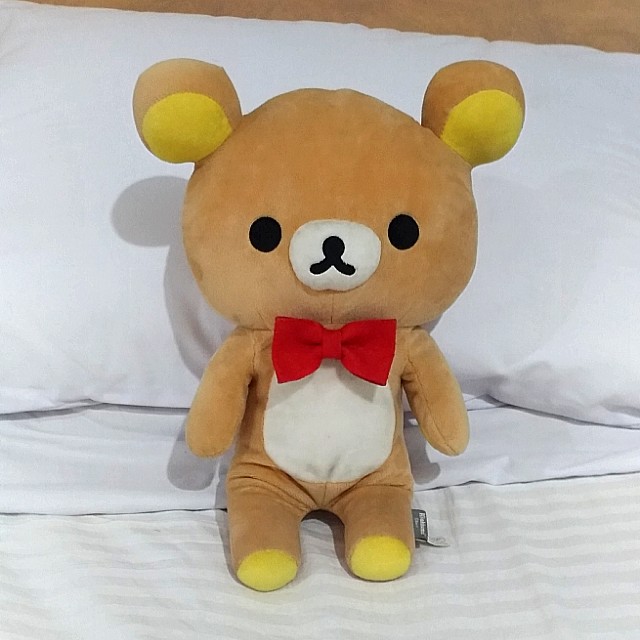 San rio Rilakkuma Stuffed Toy Authentic san x (Category: Infant Playtime) located in Manila. Submitted by pbee.preloved (Listing ID 159100246, Image 1). Description: Used as display only Bought from Korea for around 1k Good as new Bow tie was a diy, it's removable.