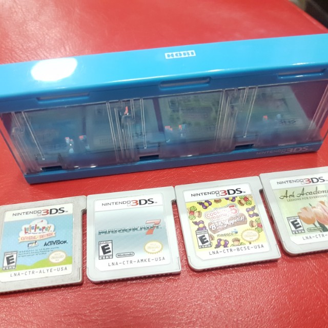 3ds games + hori cart case (Category: Nintendo) located in Manila. Submitted by kiddgamer (Listing ID 159259674, Image 1). Description: Selling my game collection plus case. All are working includung games. Package includes Mario kart Art Academy Lala loopy Cooking Mama 0926 705 4349.