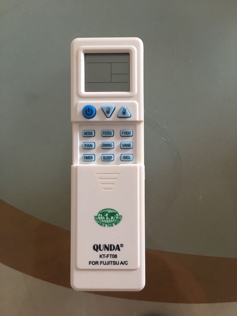 AC remote control (Category: Pest Control Supplies) located in Singapore. Submitted by lm_residence (Listing ID 159329066, Image 2). Description: Qunda airconditioner remote control Model KT-FT08E+ for fujitsu Very good quality and almost new unit Selling only 13sgd.