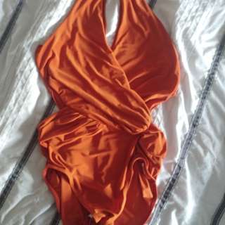 Burnt orange halter body suit