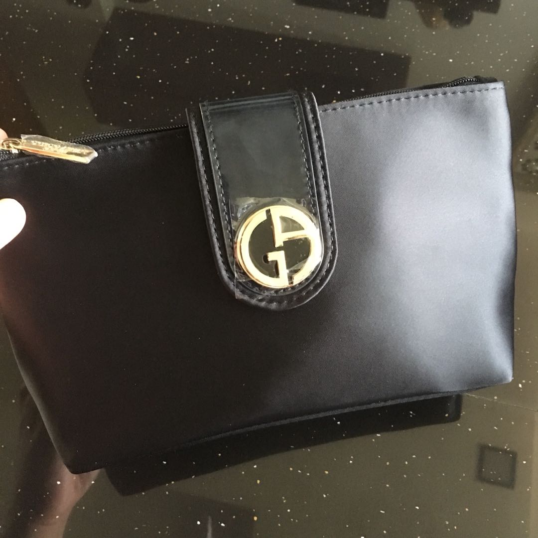 Giorgio Armani Makeup Pouch, Women's Fashion, Bags & Wallets, Purses &  Pouches on Carousell