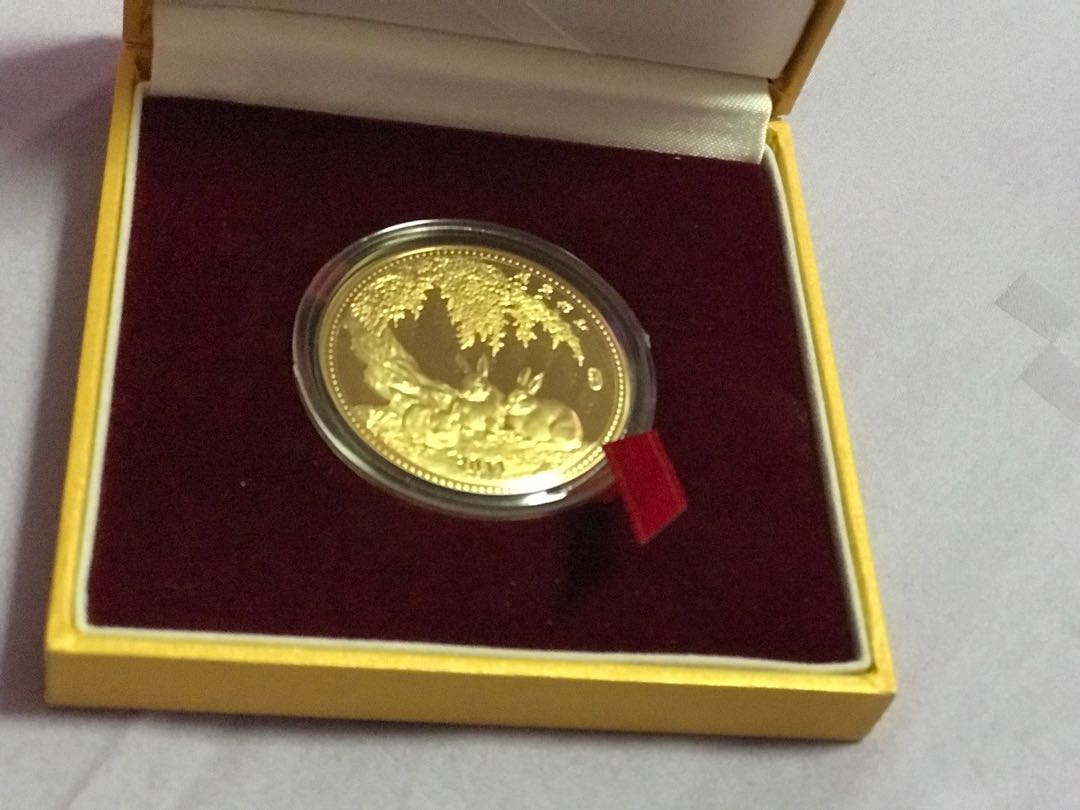 Gold rabbit coin, Luxury, Accessories on Carousell