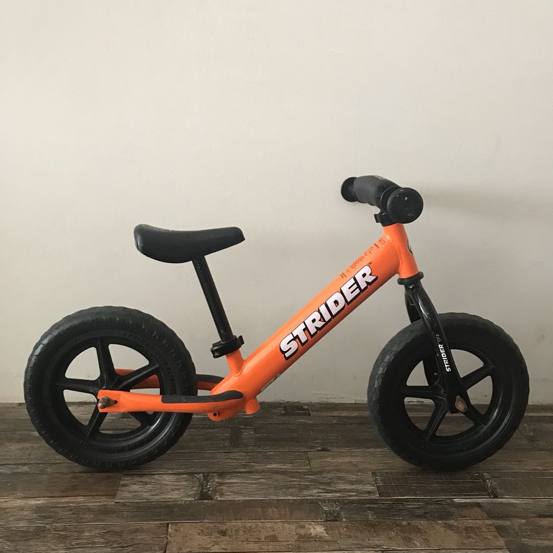 orange strider balance bike