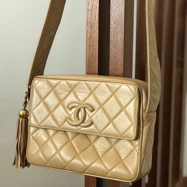 Authentic vintage classic Chanel beige camera bag with quilted leather strap